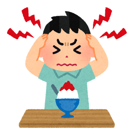 かき氷を食べて頭痛がする男の子